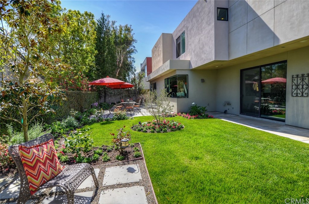 2831 Ridge Drive Laguna Beach, CA 92651 - Photo 47 of 49 a view of a chair and table under an umbrella
