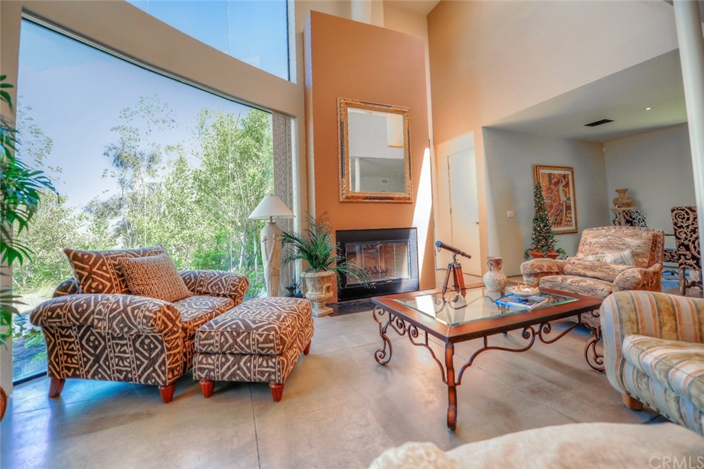 2831 Ridge Drive Laguna Beach, CA 92651 - Photo 6 of 49 a living room with furniture and a large window