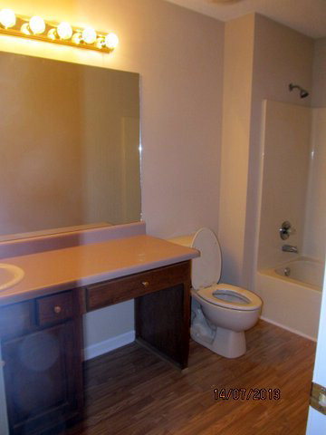 437 Comer Road Gray, GA 31032 - Photo 13 of 20 a bathroom with a sink and a mirror