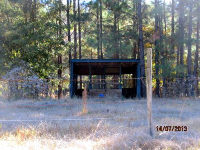 437 Comer Road Gray, GA 31032 - Photo 20 of 20 a view of a chairs and fire pit in a yard