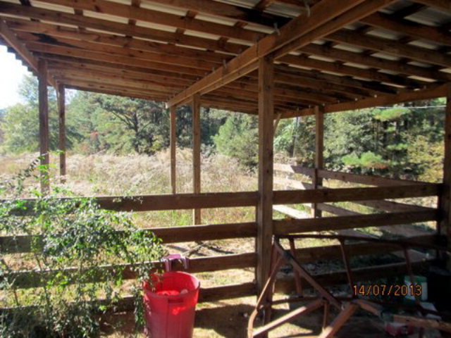 437 Comer Road Gray, GA 31032 - Photo 3 of 20 a view of a porch with furniture and a yard