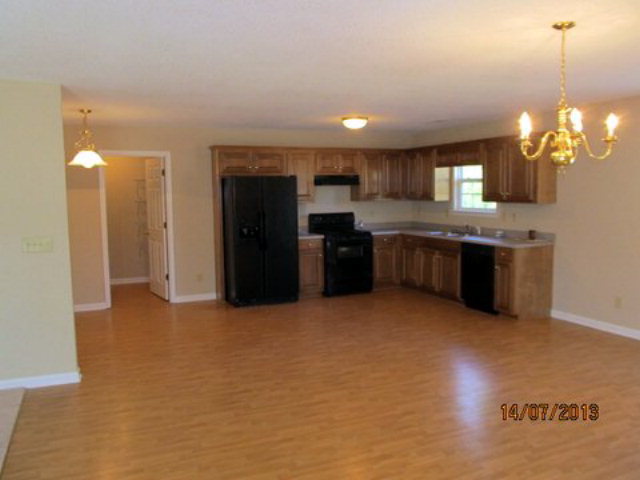 437 Comer Road Gray, GA 31032 - Photo 10 of 20 a kitchen with stainless steel appliances granite countertop a refrigerator and a sink