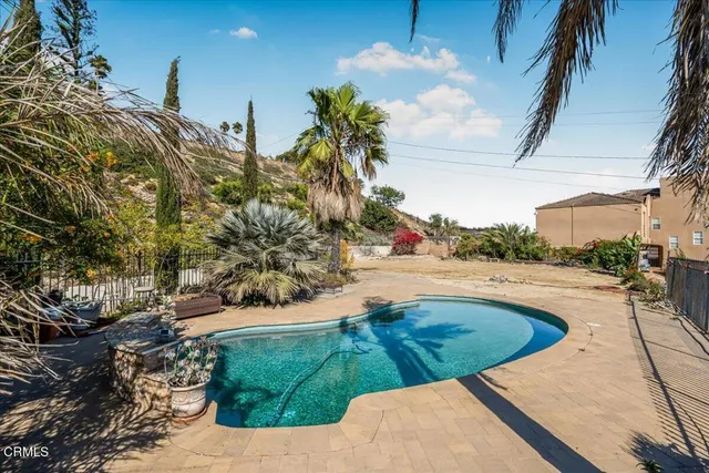 a view of outdoor space and swimming pool