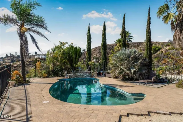 a view of outdoor space yard and swimming pool