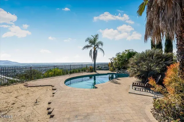 a swimming pool with a yard