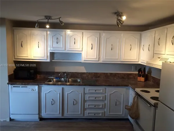 a vase of flowers sitting on a table