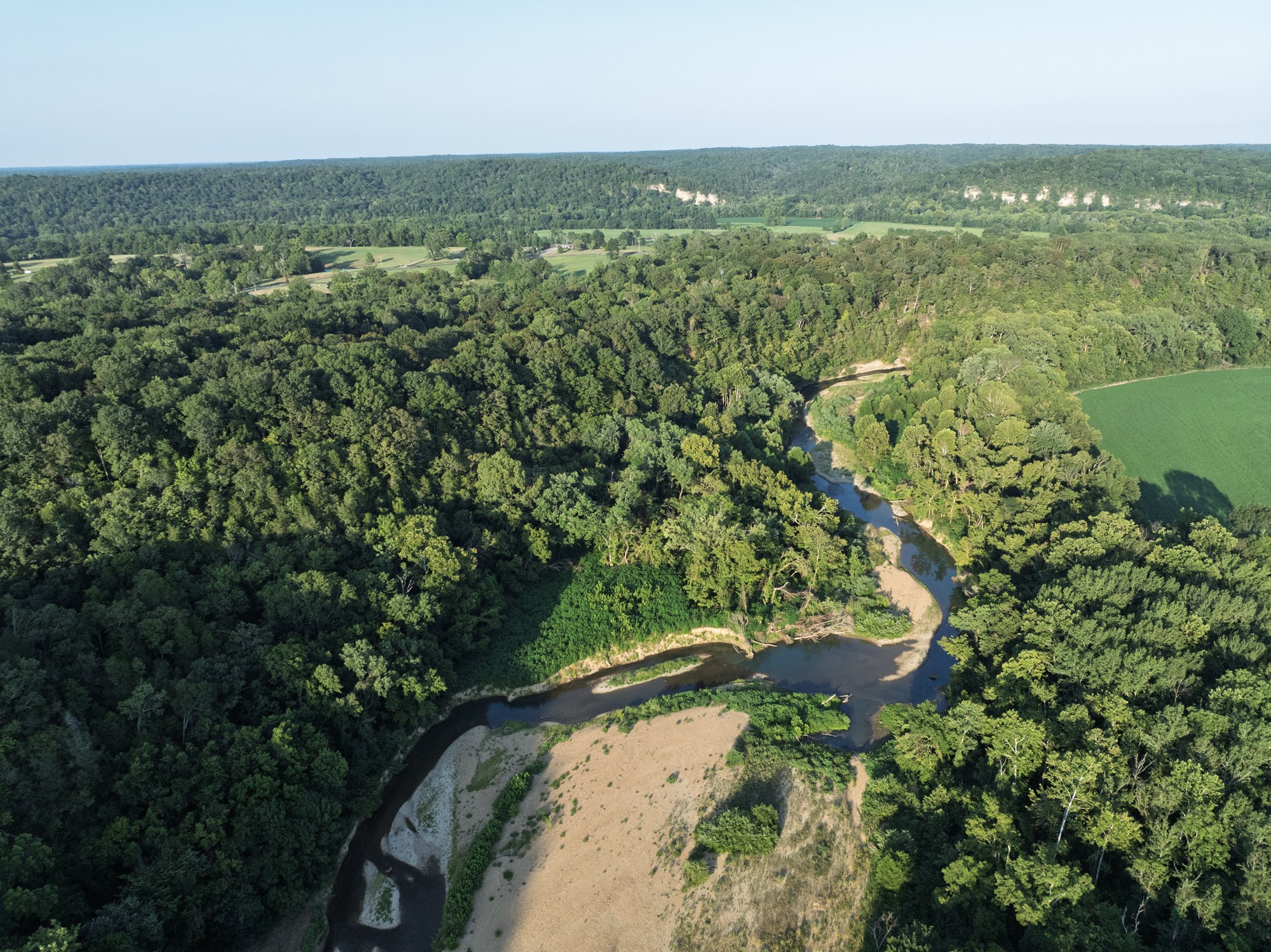 0 Collier Bend Road Charlotte, TN 37036 - Photo 55 of 77 an aerial view of a residential houses with outdoor space and trees all around