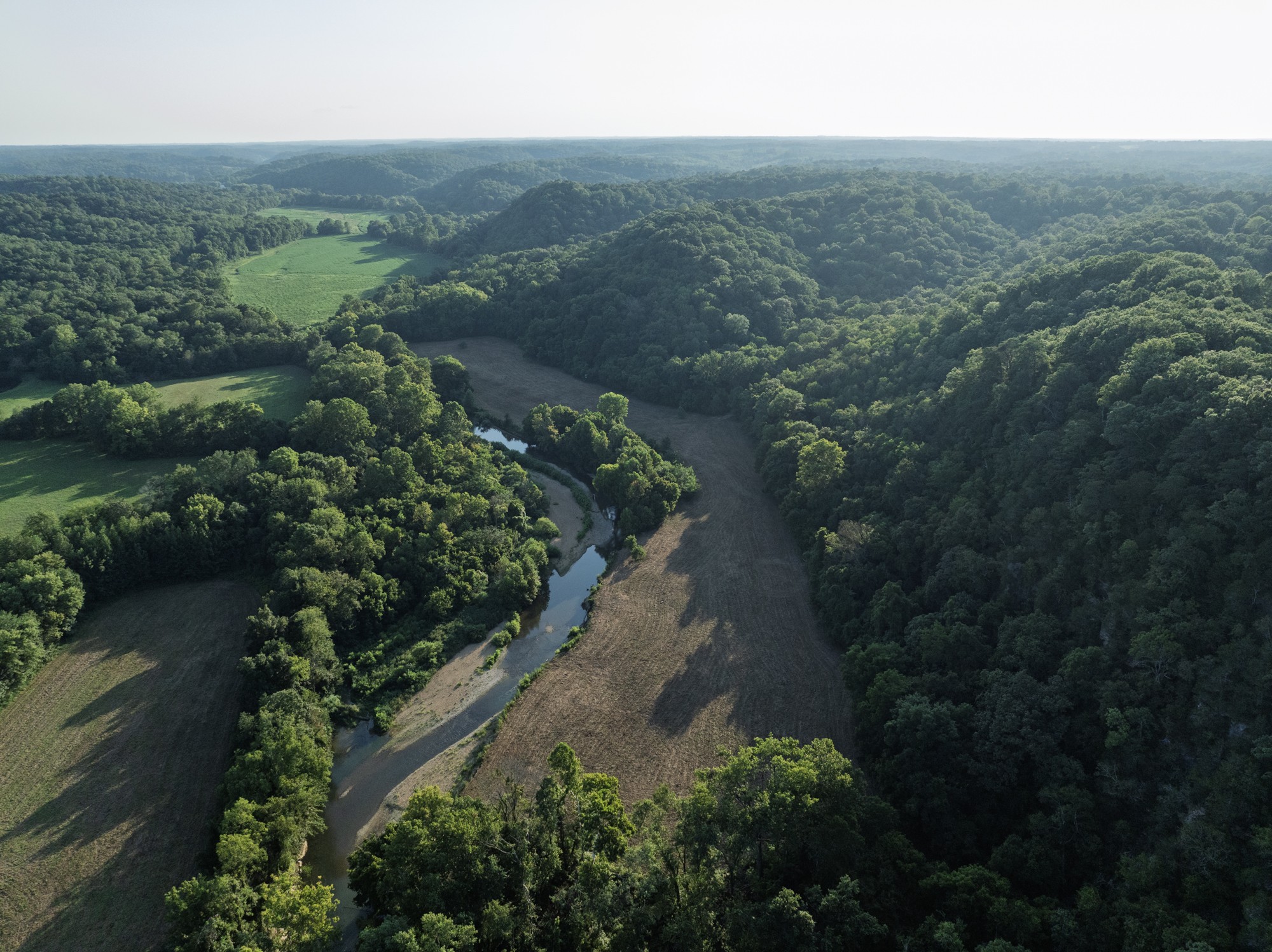 0 Collier Bend Road Charlotte, TN 37036 - Photo 59 of 77 an aerial view of residential house with outdoor space and trees all around