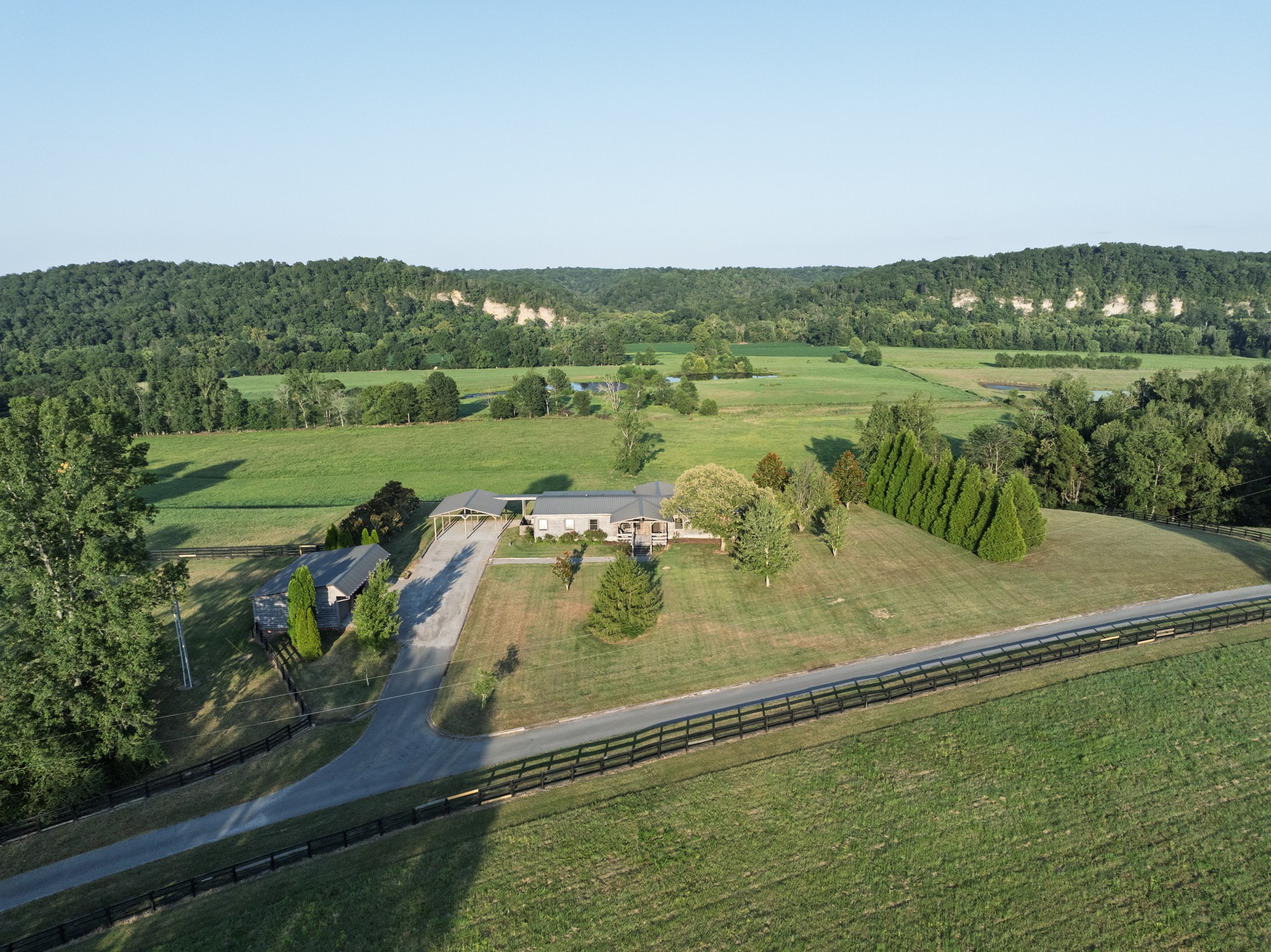 0 Collier Bend Road Charlotte, TN 37036 - Photo 68 of 77 a view of a lake with a yard