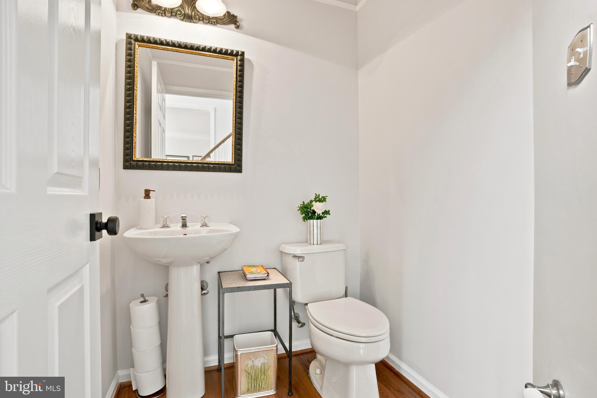 2303 Redtail Road Norristown, PA 19403 - Photo 9 of 53 a bathroom with a toilet sink and mirror