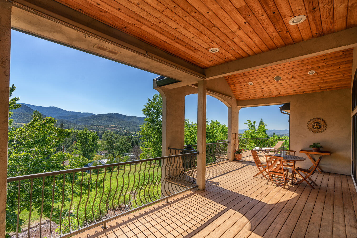 7891 Rapp Lane Talent, OR 97540 - Photo 45 of 88 a view of a balcony with chairs and wooden floor