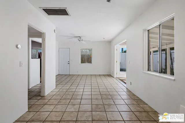 a view of an empty room and window