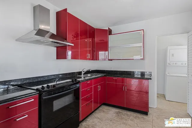 a kitchen with a stove and a microwave