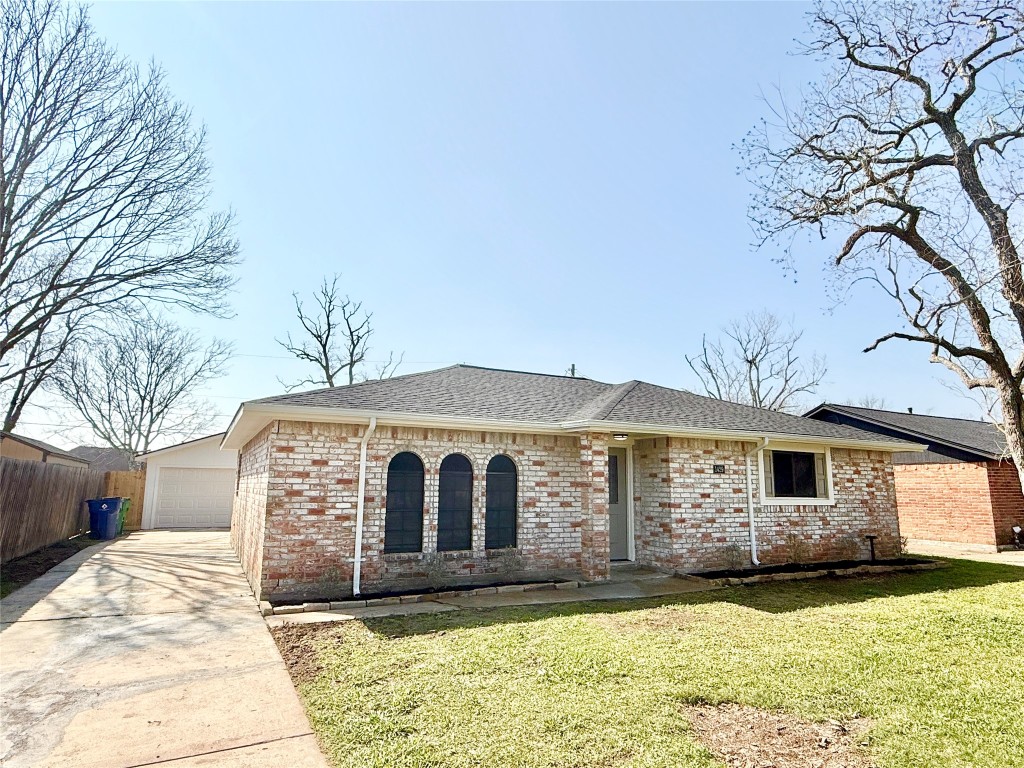 1429 Northview Drive Angleton, TX 77515 - Photo 1 of 29 a front view of a house with a yard