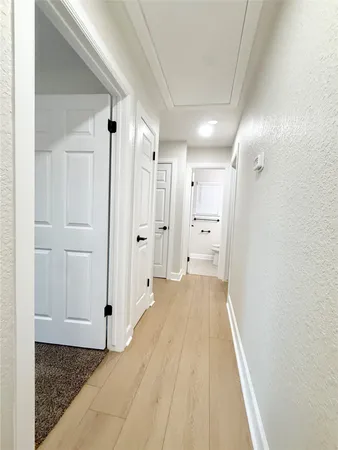 a view of a room with white walls