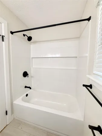 a bathroom with a bathtub