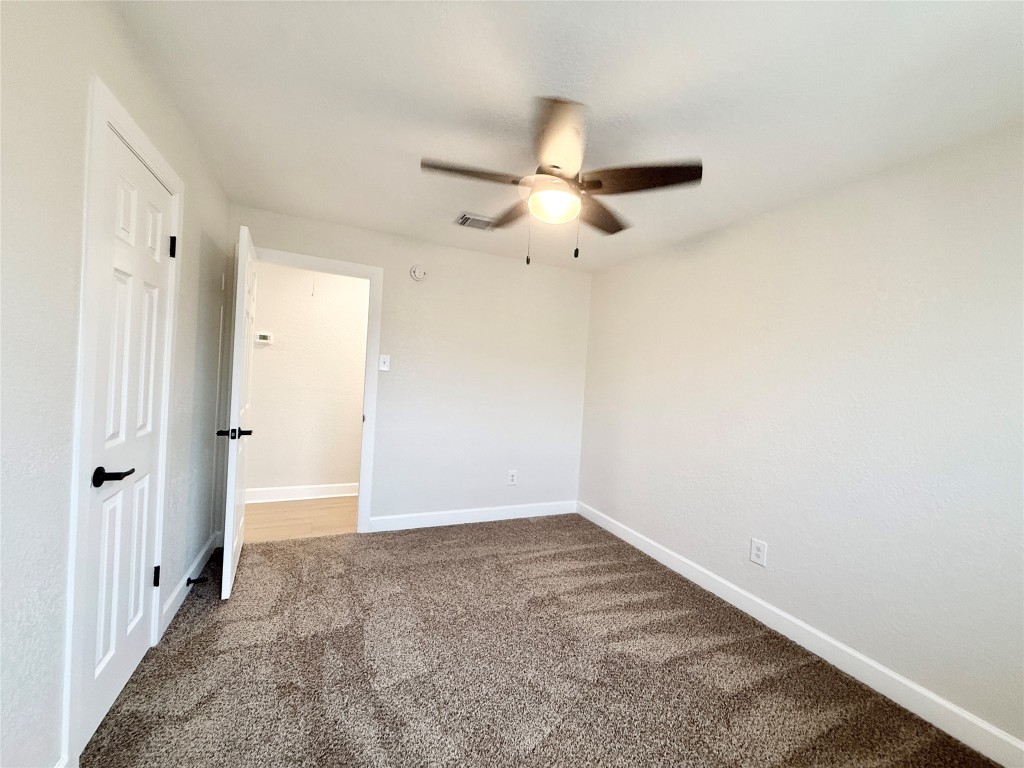 1429 Northview Drive Angleton, TX 77515 - Photo 27 of 29 wooden floor in an empty room