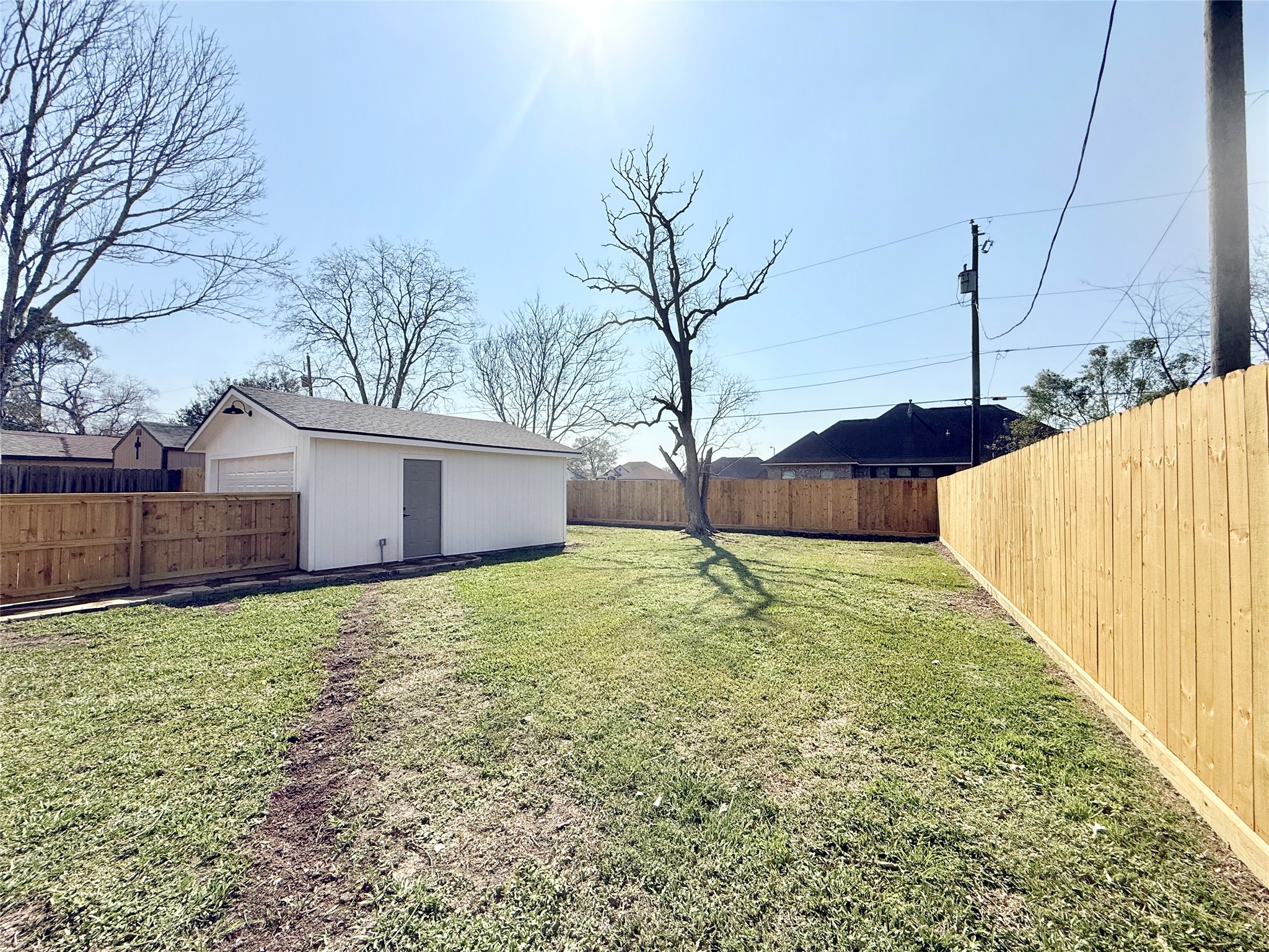 1429 Northview Drive Angleton, TX 77515 - Photo 28 of 29 a view of a backyard with a garden