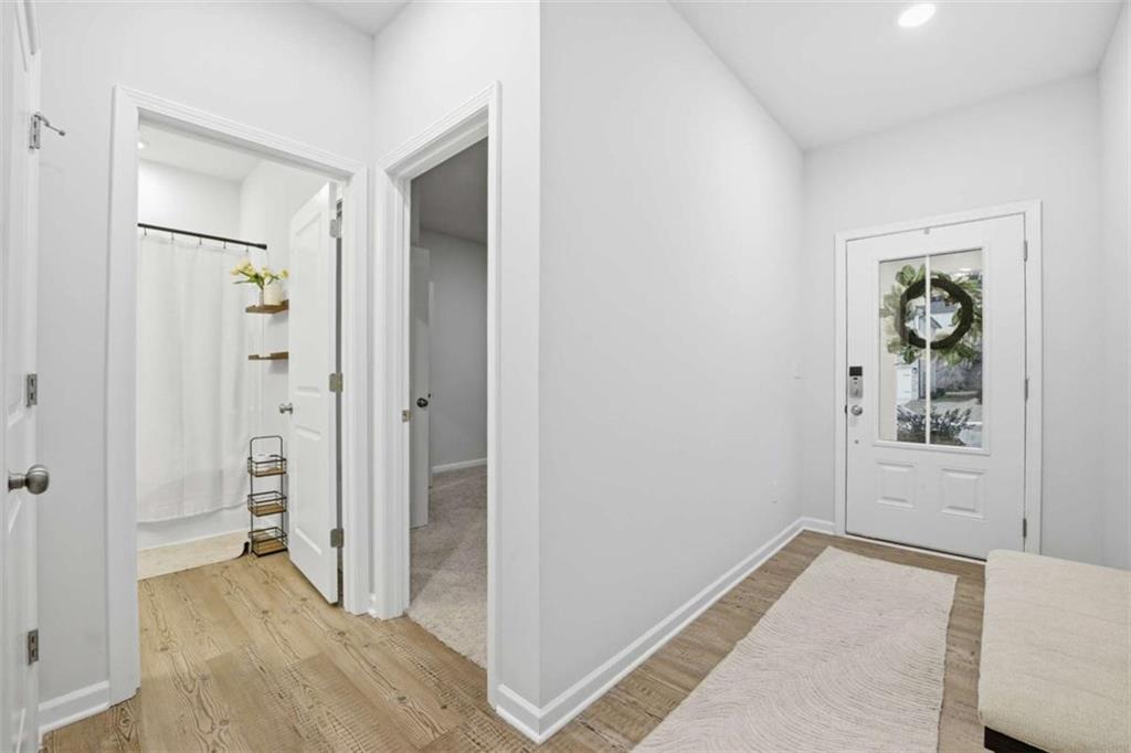 7129 Timberland Trail Lithonia, GA 30058 - Photo 20 of 43 an empty room that has a wooden cupboard