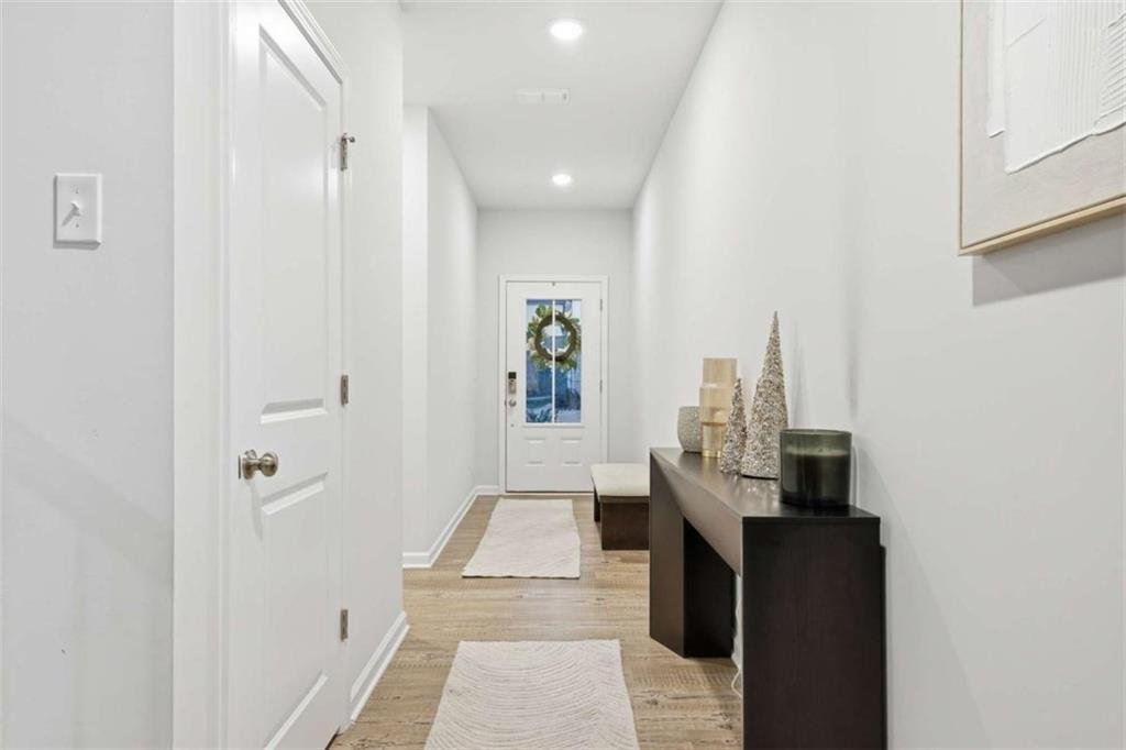 7129 Timberland Trail Lithonia, GA 30058 - Photo 23 of 43 a view of a hallway with seating area