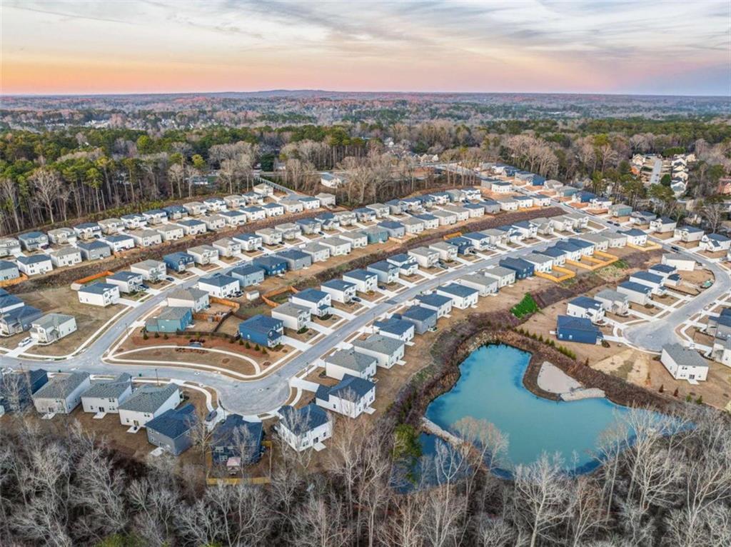 7129 Timberland Trail Lithonia, GA 30058 - Photo 6 of 43 an aerial view of residential houses with outdoor space