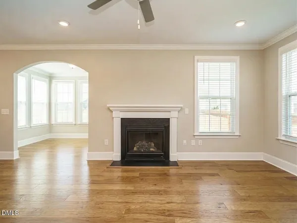 a en suite bathroom with a double vanity sink a mirror and a shower