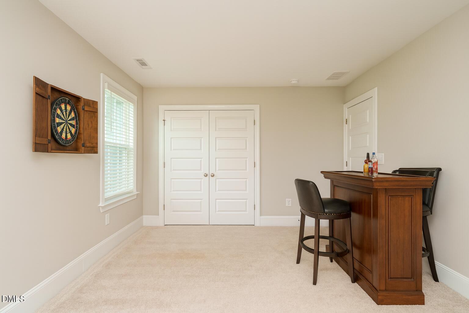 507 Dungannon Loop Clayton, NC 27520 - Photo 23 of 36 a view of a workspace with furniture and window
