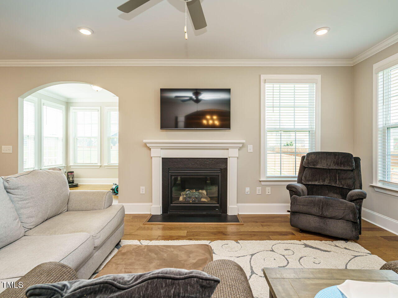 507 Dungannon Loop Clayton, NC 27520 - Photo 10 of 36 a living room with furniture and a fireplace