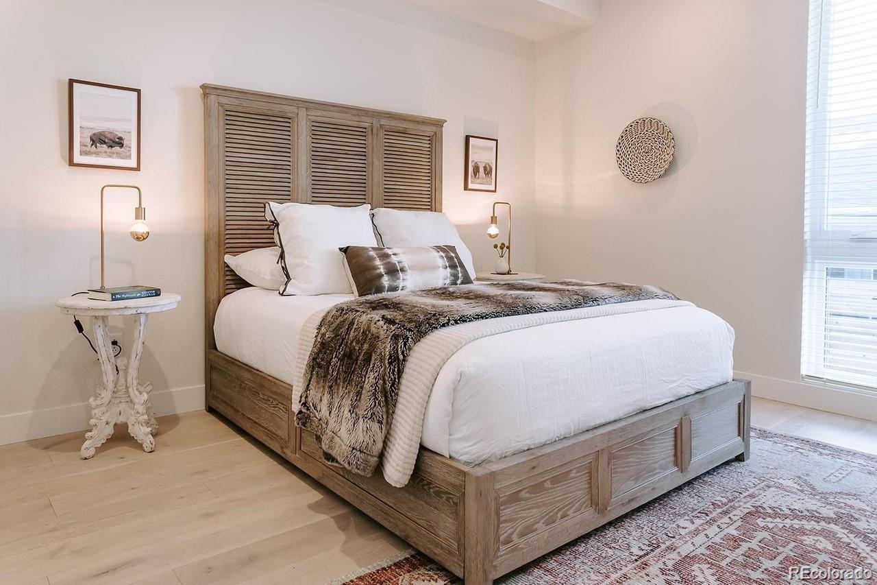5125 West 29th Avenue, Unit 6 Denver, CO 80212 - Photo 15 of 26 a bedroom with a bed and window