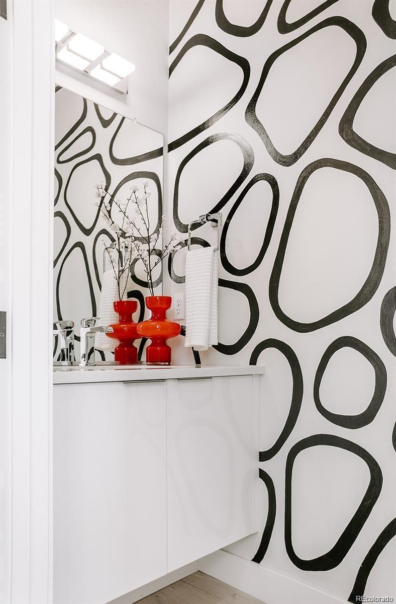 5125 West 29th Avenue, Unit 6 Denver, CO 80212 - Photo 23 of 26 a bathroom with a stove and a sink