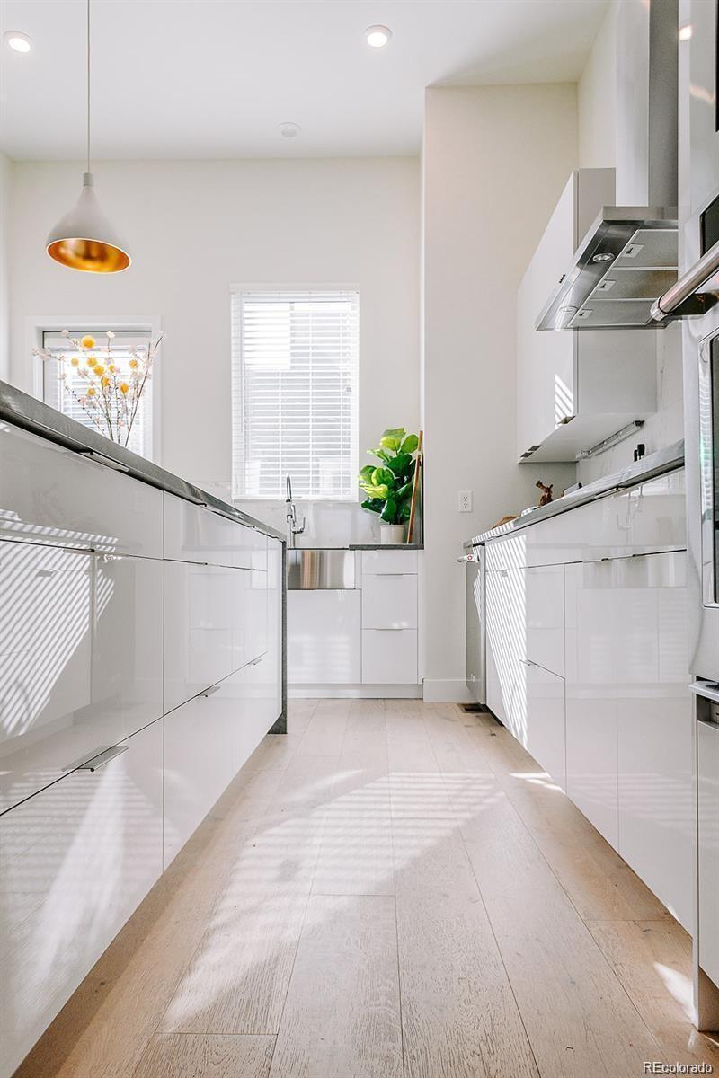 5125 West 29th Avenue, Unit 6 Denver, CO 80212 - Photo 4 of 26 a view of a kitchen with electric equipment