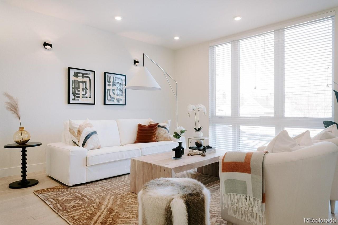 5125 West 29th Avenue, Unit 6 Denver, CO 80212 - Photo 8 of 26 a living room with furniture and windows