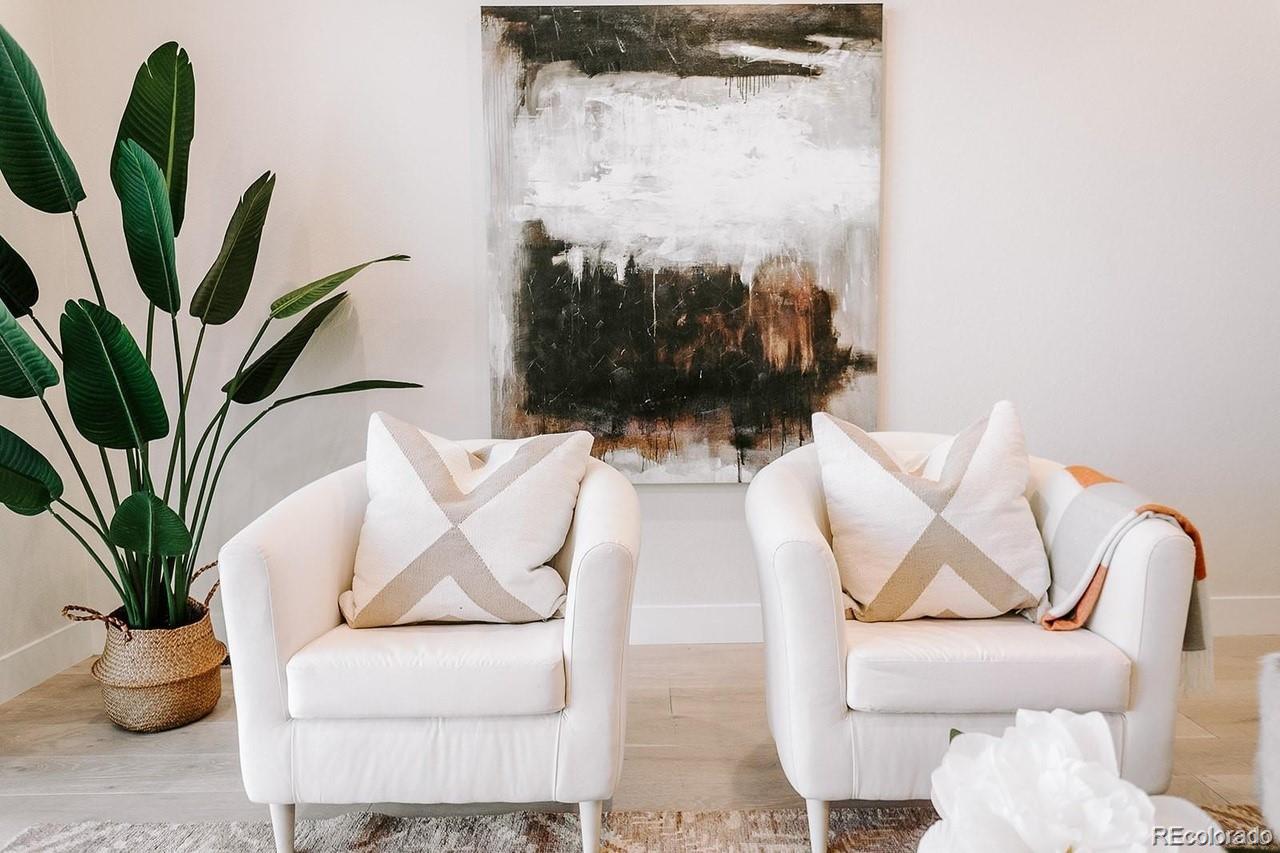 5125 West 29th Avenue, Unit 6 Denver, CO 80212 - Photo 9 of 26 a living room with furniture flowerpot and a potted plant