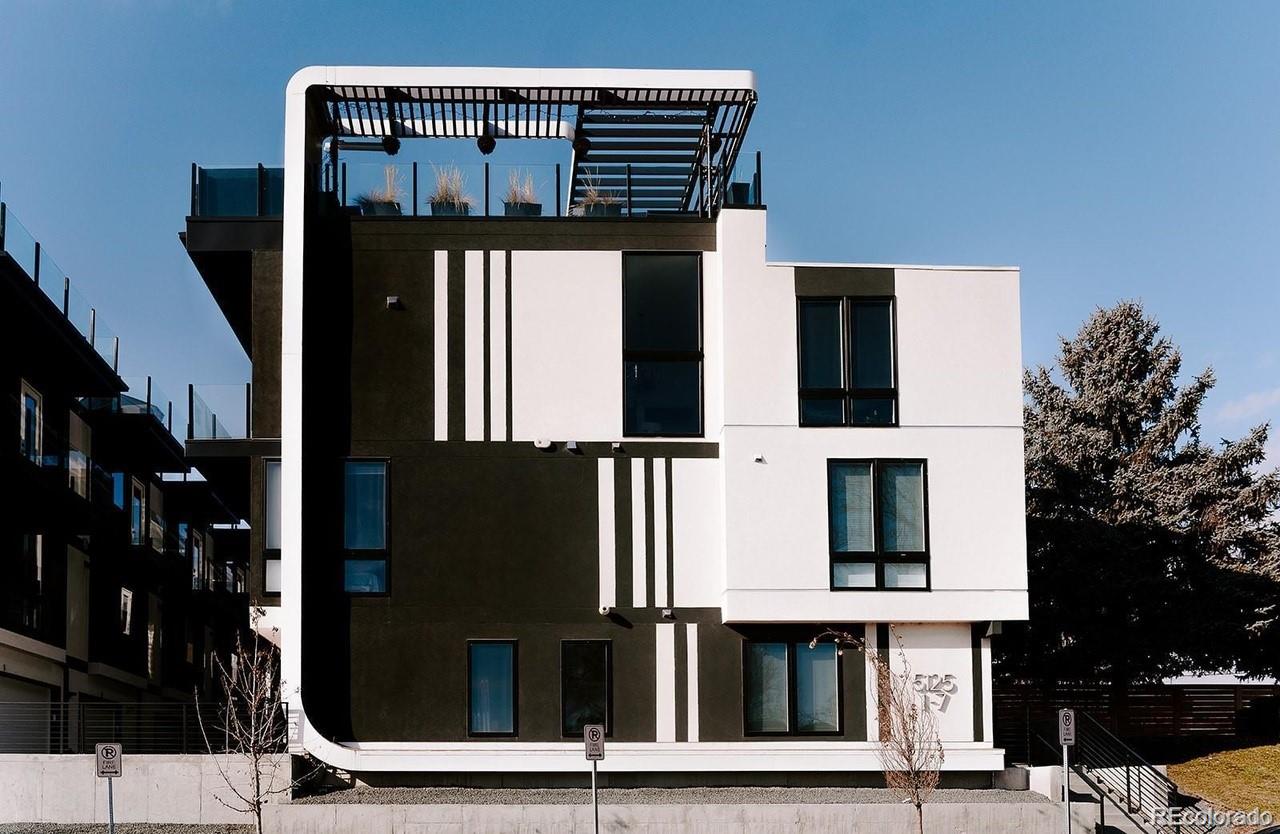 5125 West 29th Avenue, Unit 6 Denver, CO 80212 - Photo 10 of 26 a front view of a building with street