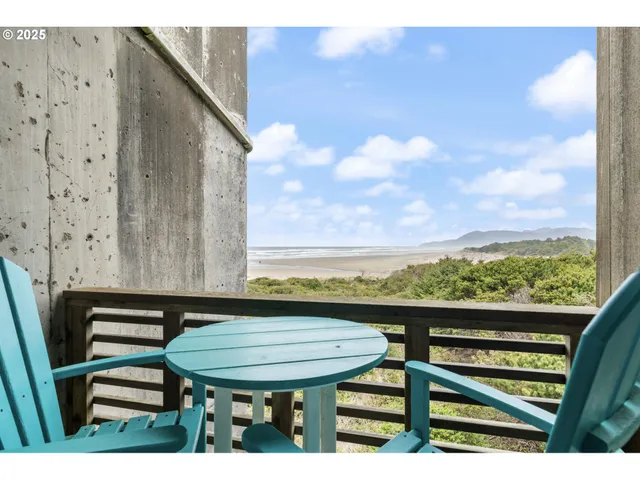 a view of a balcony with chairs