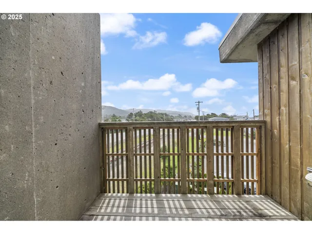 a view of balcony with a potted plant