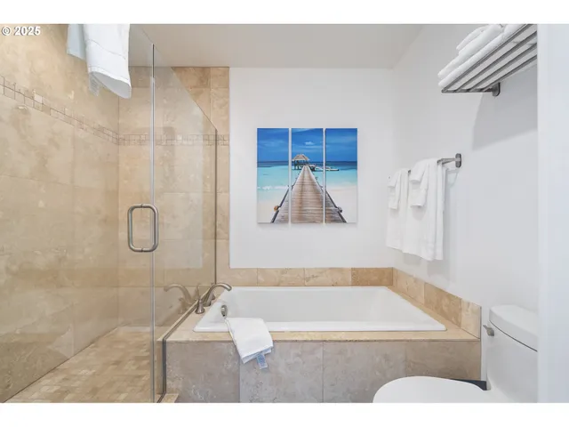 a bathroom with a shower and a sink