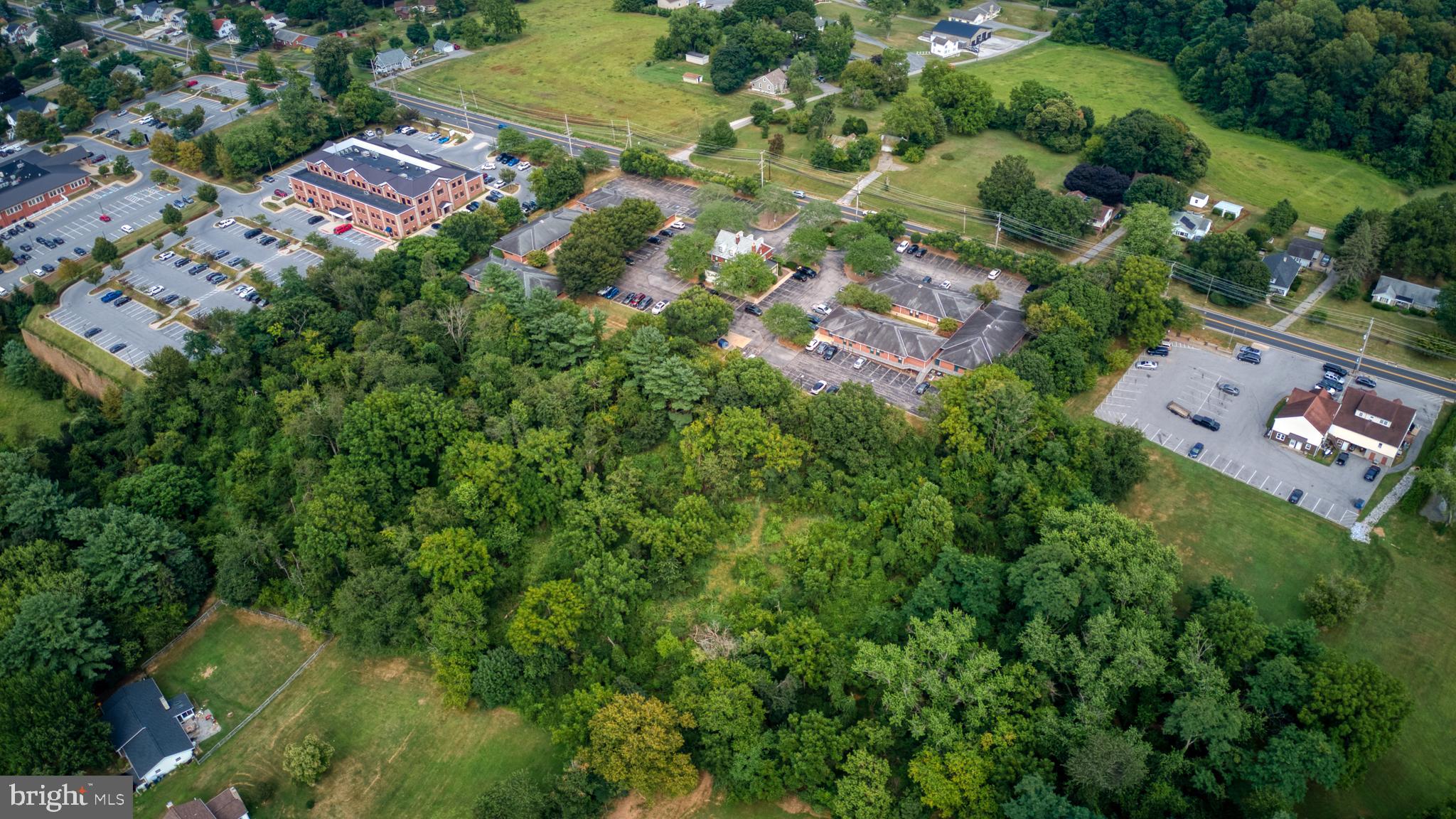 Washington Road Westminster, MD 21157 - Photo 9 of 15 an aerial view of residential house with outdoor space and trees all around