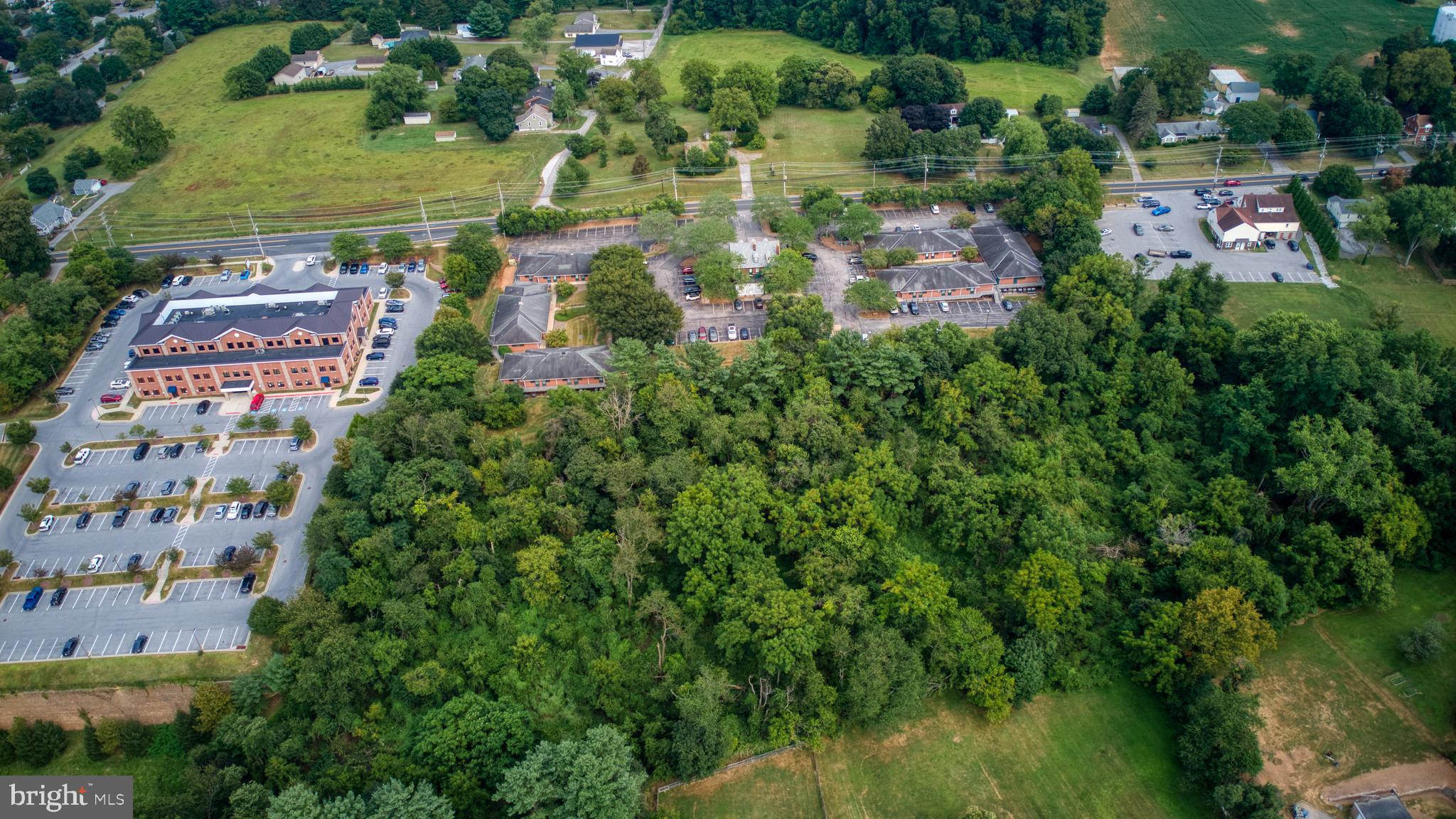 Washington Road Westminster, MD 21157 - Photo 10 of 15 an aerial view of residential houses with outdoor space and trees