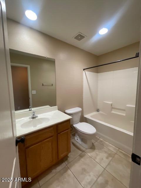 17032 North 16th Drive, Unit 4 Phoenix, AZ 85023 - Photo 9 of 9 a bathroom with a double vanity sink toilet and a mirror