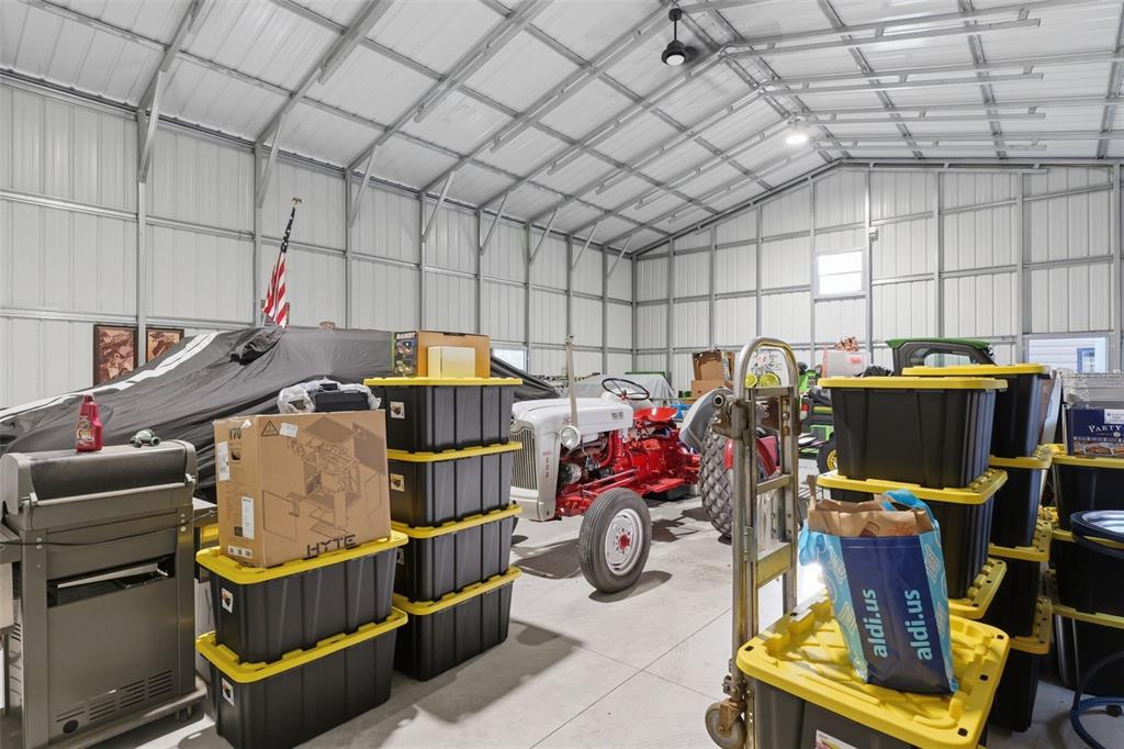 14582 Boland Avenue Spring Hill, FL 34610 - Photo 53 of 74 a storage room with furniture