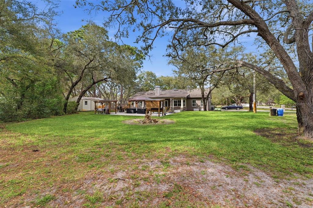 14582 Boland Avenue Spring Hill, FL 34610 - Photo 57 of 74 front view of a house with a yard