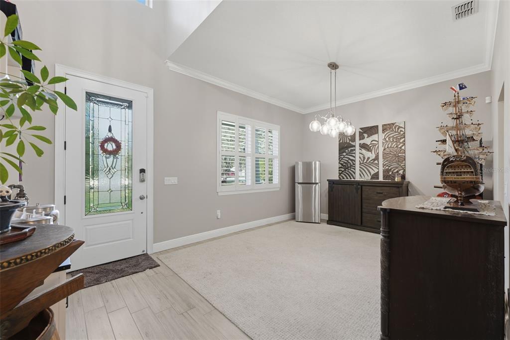 14582 Boland Avenue Spring Hill, FL 34610 - Photo 10 of 74 a bedroom with a bed dresser and a window
