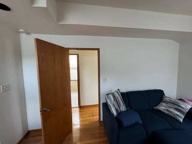 a view of a hallway with front door