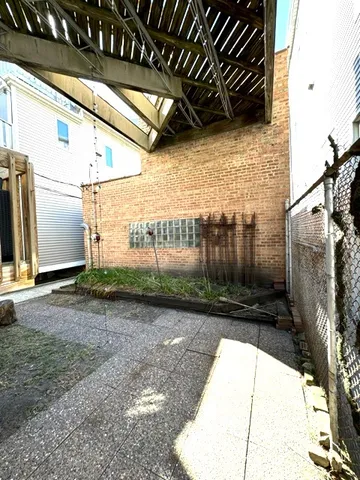 a view of a back yard of the house