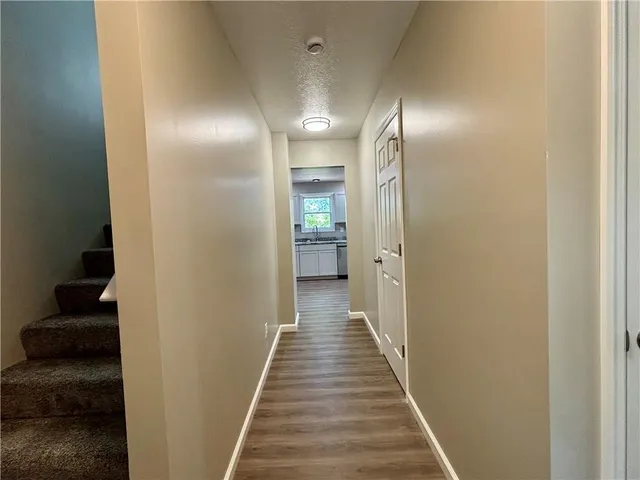 a view of livingroom with furniture and wooden floor