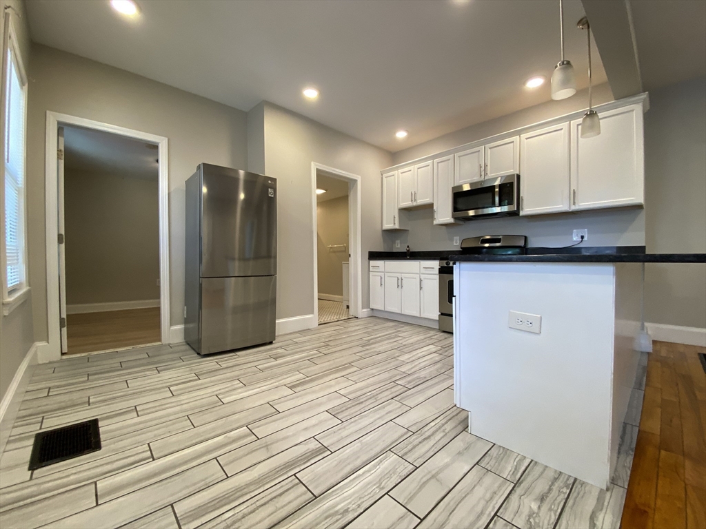 10 Howell Court, Unit 1 Chelsea, MA 02150 - Photo 2 of 31