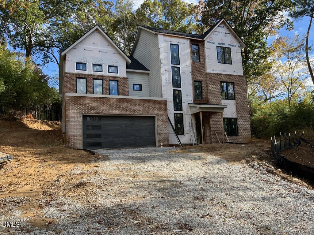 1001 Phoenix Place Raleigh, NC 27610 - Photo 2 of 13 a view of house with outdoor space and swimming pool