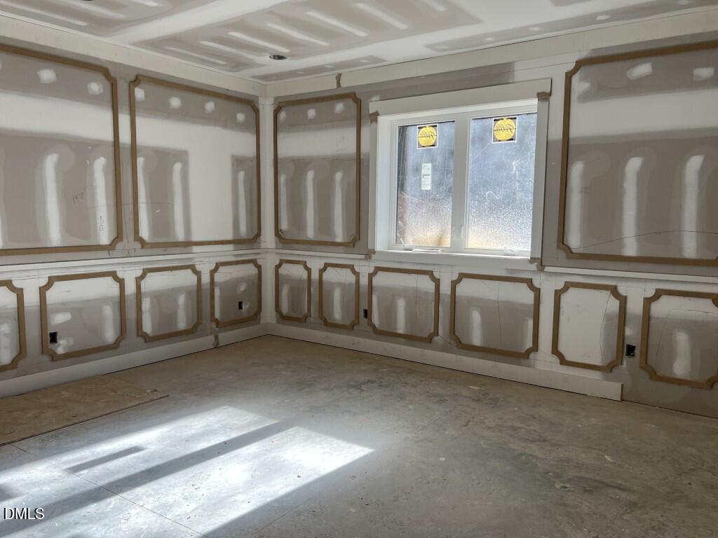 1001 Phoenix Place Raleigh, NC 27610 - Photo 9 of 13 a view of a bathroom with granite countertop a mirror and a bathtub