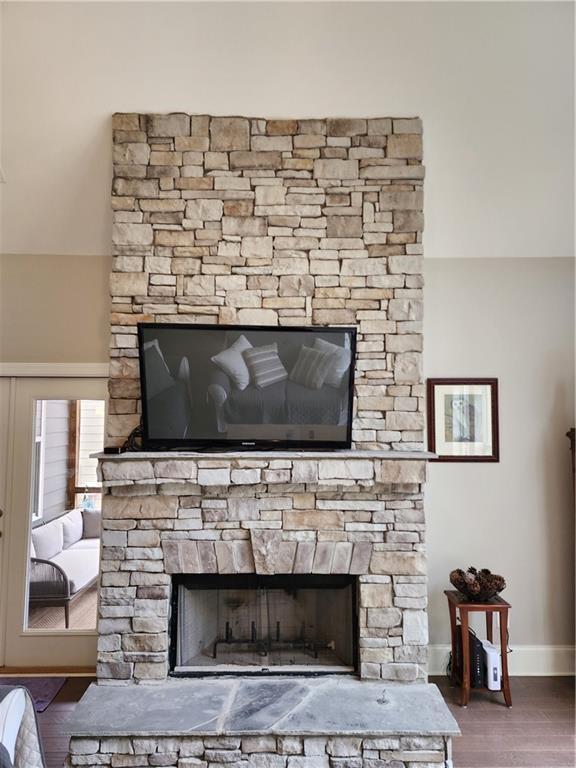 194 Yorkshire Lane Villa Rica, GA 30180 - Photo 16 of 20 a living room with a fireplace and a flat screen tv